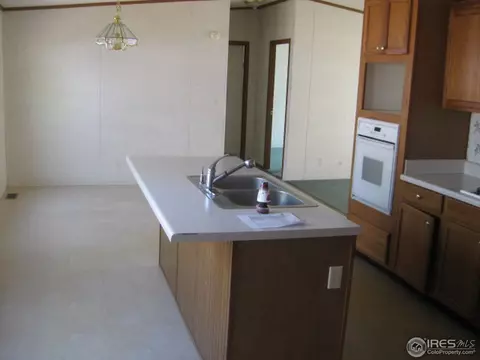 1016 Macdavidson Cir, Dacono, CO 80514 photo 11