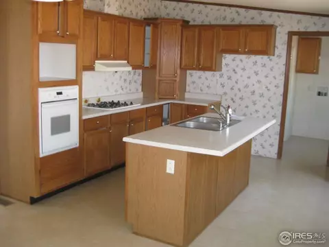 1016 Macdavidson Cir, Dacono, CO 80514 photo 12