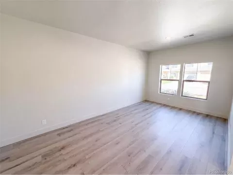 Living - 19036 Randolph Pl, Denver, CO 80249 photo 9 of 11