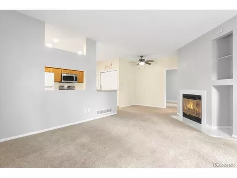 Living - 13711 E Lehigh Ave #A, Aurora, CO 80014 photo 1 of 3