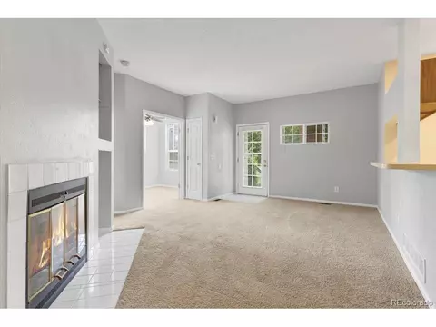 Living - 13711 E Lehigh Ave #A, Aurora, CO 80014 photo 2 of 3