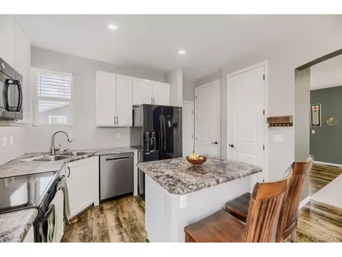 Kitchen - 715 Stonehaven St, Dacono, CO 80514 photo 2 of 3