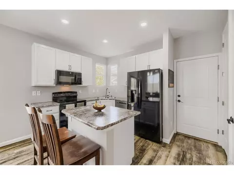 Kitchen - 715 Stonehaven St, Dacono, CO 80514 photo 3 of 3