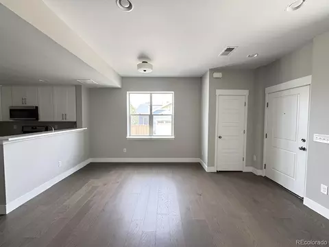 Living - 11137 E 25th Ave, Aurora, CO 80010 photo 4 of 5