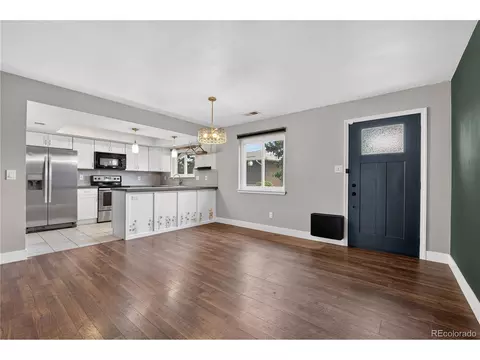 Living - 9070 E Lehigh Ave, Denver, CO 80237 photo 1 of 6