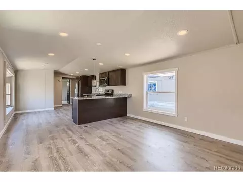 1215 Macdee Ct, Dacono, CO 80514 photo 2