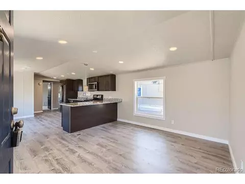 1215 Macdee Ct, Dacono, CO 80514 photo 1