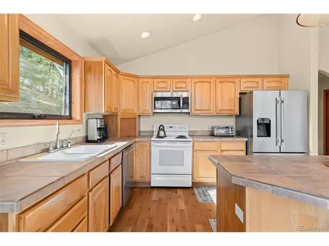 Kitchen - 9831 S Warhawk Rd, Conifer, CO 80433 photo 2 of 4