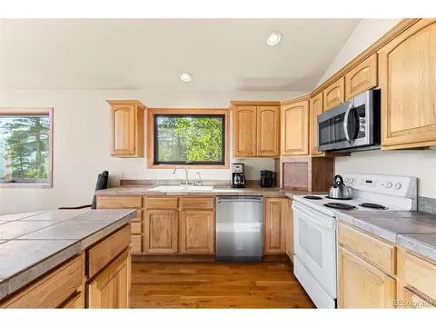 Kitchen - 9831 S Warhawk Rd, Conifer, CO 80433 photo 4 of 4