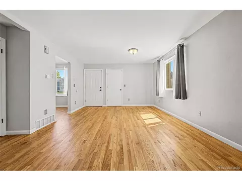 Living - 11891 Madison Pl, Thornton, CO 80233 photo 5 of 8