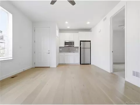 Living - 9989 E 62nd Ave, Denver, CO 80238 photo 3 of 4