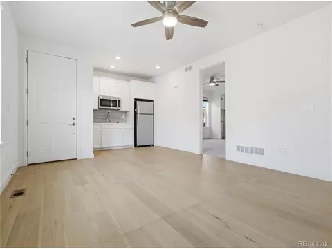 Living - 9989 E 62nd Ave, Denver, CO 80238 photo 2 of 4