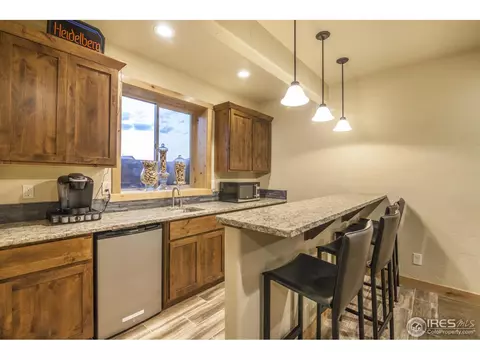 5682 Mid Pointe Dr, Windsor, CO 80550 photo 26
