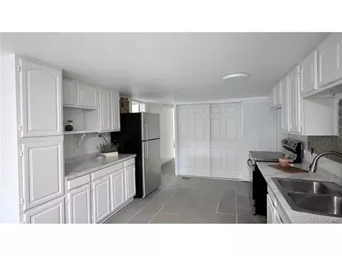 Kitchen - 7486 Patrick St, Fort Lupton, CO 80621 photo 2 of 3