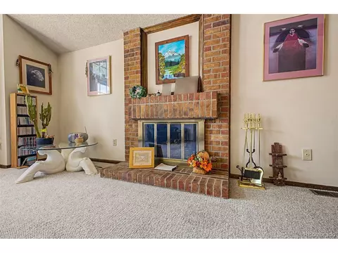 Living - 8780 W 80th Dr, Arvada, CO 80005 photo 2 of 5