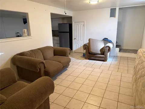 Living - 5520 Eagle St, Denver, CO 80239 photo 2 of 2