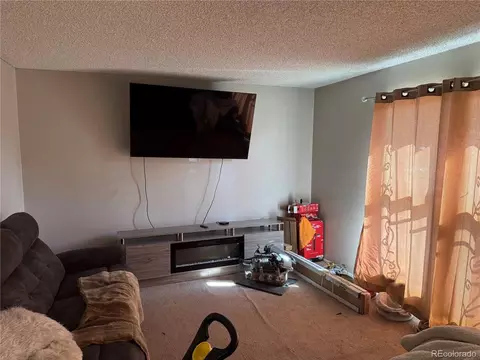 Living - 5520 Eagle St, Denver, CO 80239 photo 1 of 2