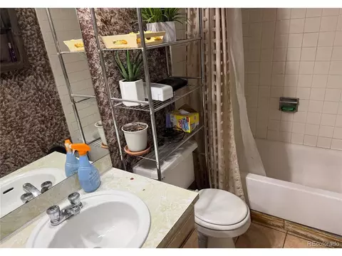 Bath - 5520 Eagle St, Denver, CO 80239 photo 2 of 3