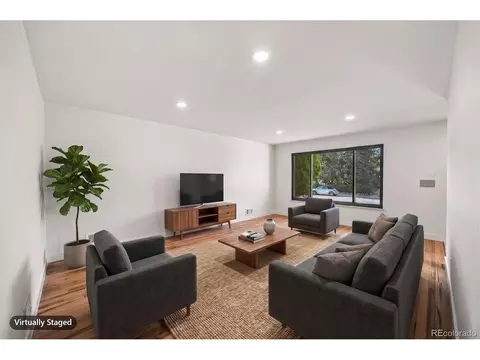Living - 13899 E 25th Ave, Aurora, CO 80011 photo 2 of 4