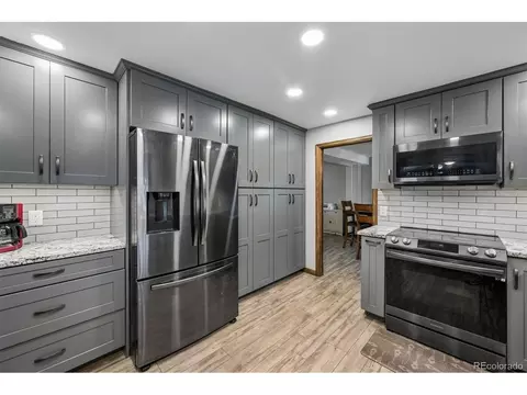 Kitchen - 7226 Robb Dr, Arvada, CO 80005 photo 4 of 5