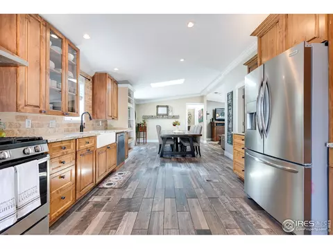 1123 Macdavidson Cir, Dacono, CO 80514 photo 2
