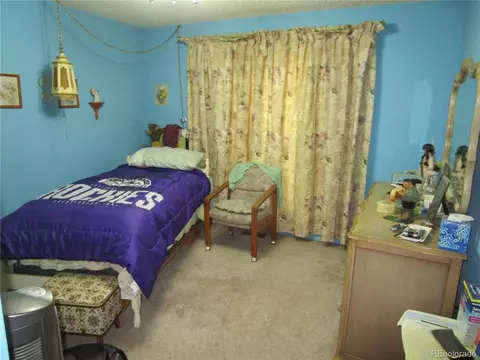 Bedroom - 11930 Exposition Ave, Aurora, CO 80012 photo 1 of 3