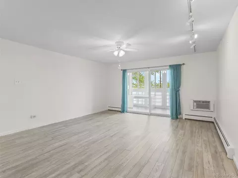 Living - 9155 E Center Ave #2B, Denver, CO 80247 photo 2 of 3
