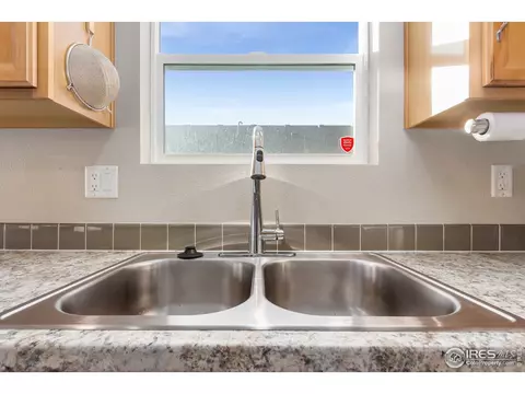 3304 Sheltered Harbor Dr, Evans, CO 80620 photo 9