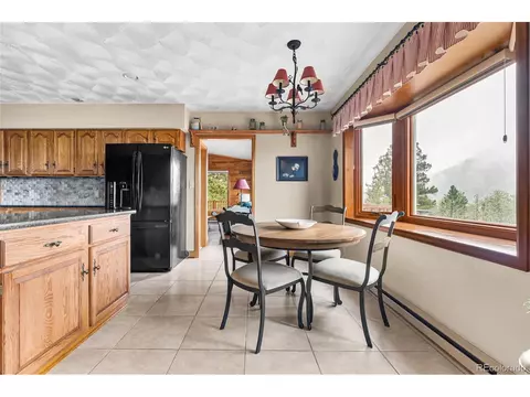 Dining - 48 Allen Cir, Pine, CO 80470 photo 3 of 3
