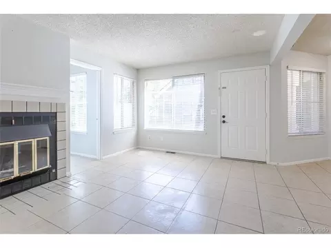 Living - 13833 E Lehigh Ave #D, Aurora, CO 80014 photo 2 of 3