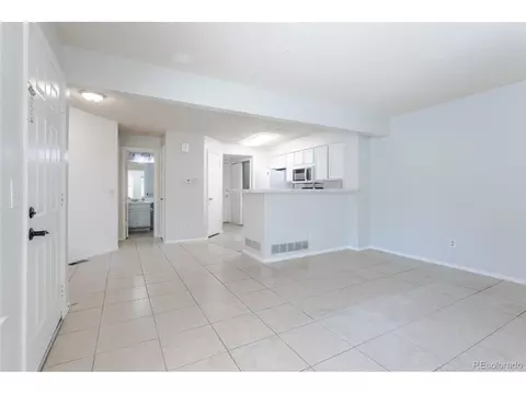 Living - 13833 E Lehigh Ave #D, Aurora, CO 80014 photo 3 of 3
