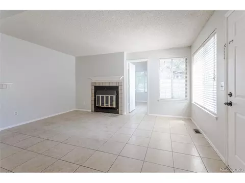 Living - 13833 E Lehigh Ave #D, Aurora, CO 80014 photo 1 of 3