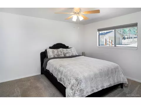 Bedroom - 11744 S Stallion Dr, Pine, CO 80470 photo 1 of 4