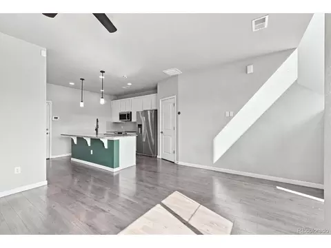 Living - 15446 W 64th Loop #D, Arvada, CO 80007 photo 2 of 4
