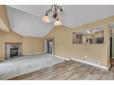 Living - 998 E 133rd Ave, Thornton, CO 80241 photo 6 of 9