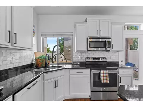 Kitchen - 18631 E 53rd Ave, Denver, CO 80249 photo 6 of 10