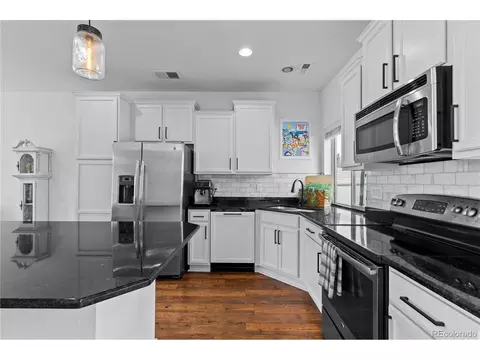 Kitchen - 18631 E 53rd Ave, Denver, CO 80249 photo 8 of 10