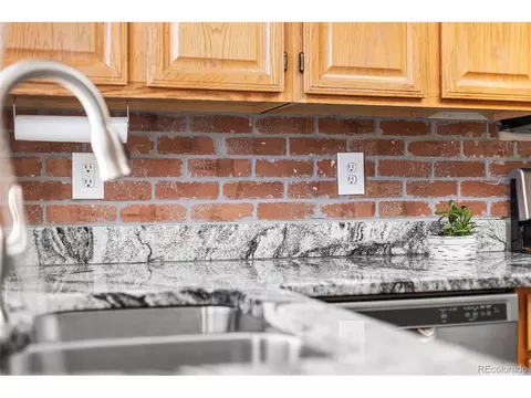 Kitchen - 16066 E Ithaca Pl #B, Aurora, CO 80013 photo 9 of 10