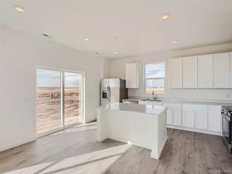 665 Heartland Dr, Bennett, CO 80102 photo 9