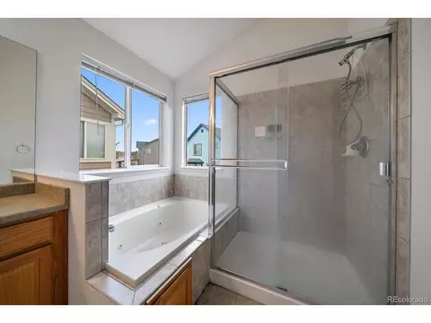 Bath - 5552 Jasper St, Denver, CO 80239 photo 2 of 3