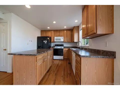 Kitchen - 5552 Jasper St, Denver, CO 80239 photo 2 of 3
