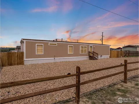 220 Larch Dr, Log Lane Village, CO 80705