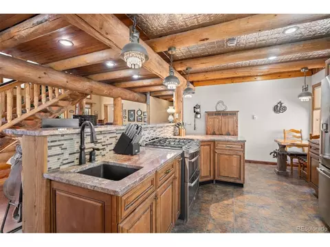 Kitchen - 17025 SW Platte River Rd, Pine, CO 80470 photo 4 of 4