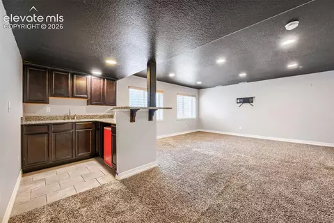 Living - 10202 Boulder Ridge Dr, Peyton, CO 80831 photo 4 of 5