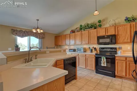 Kitchen - 12590 Lazy E Rd, Peyton, CO 80831 photo 3 of 6