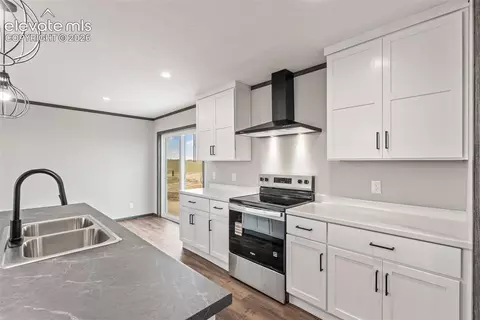Kitchen - 35750 Vorenberg Rd, Yoder, CO 80864 photo 6 of 7