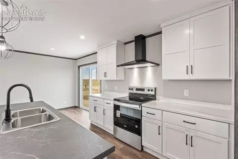 Kitchen - 35750 Vorenberg Rd, Yoder, CO 80864 photo 6 of 7