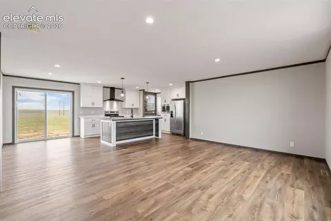 Living - 35750 Vorenberg Rd, Yoder, CO 80864 photo 4 of 5