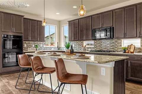 Kitchen - 9563 Fairway Glen Dr, Peyton, CO 80831 photo 2 of 6