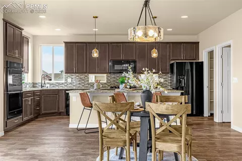 Dining - 9563 Fairway Glen Dr, Peyton, CO 80831 photo 2 of 3